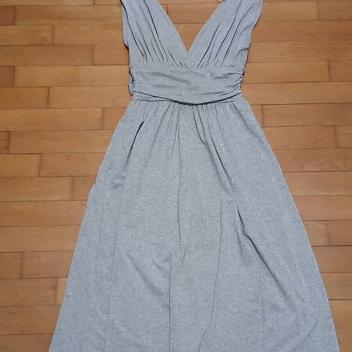 Dress gray silver with V neckline and bow tie at waist size Medium like new