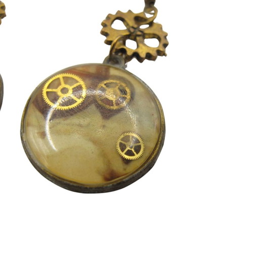 Vintage steampunk style earrings with brass gears like new