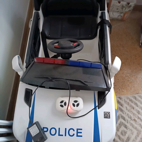 Children's police toy car like new with charger and remote control