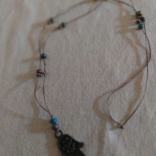 Long boho hamsa hand necklace like new, brown and blue