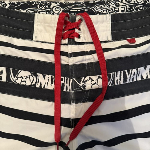 Men's surf style swim shorts striped white black with red cord size L used