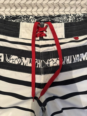 Men's surf style swim shorts striped white black with red cord size L used