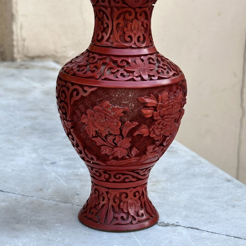 Vintage red carved vase with embossed flowers used, 19cm