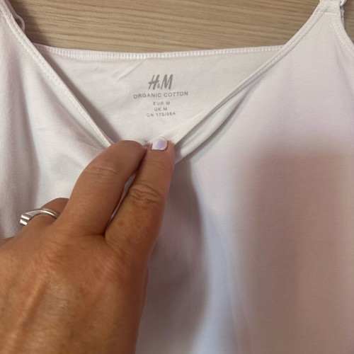 H&M white nursing tank top with adjustable straps and easy-release clips