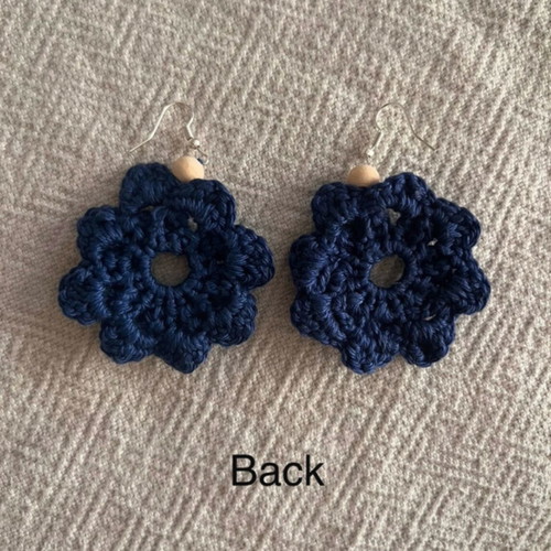 Handmade crochet flower-shaped earrings in navy blue