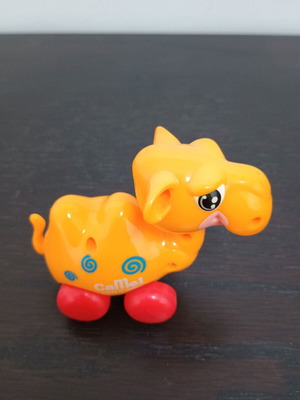 Camel toy yellow with red wheels new