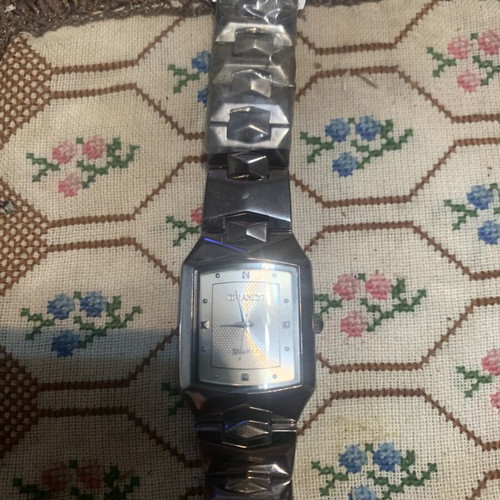 Orlando Quartz women's wristwatch, silver stainless steel with embossed pyramids