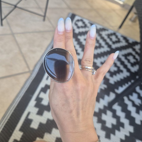 Adjustable ring like new, brown