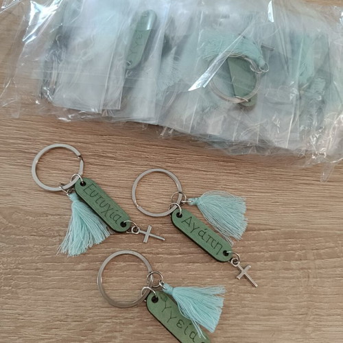 Martyrika keychains new, pack of 49 with silver ring and cross