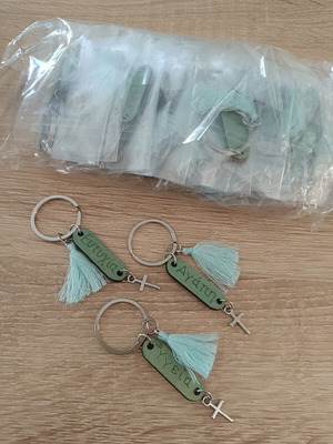 Martyrika keychains new, pack of 49 with silver ring and cross