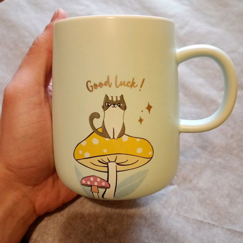 Mug with cat in good condition