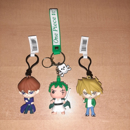Yu-Gi-Oh and One Piece keychains like new, set of 3