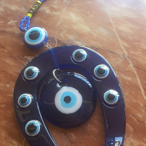 Gouri horseshoe with evil eye charm
