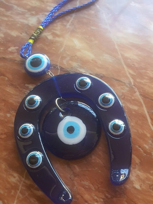 Gouri horseshoe with evil eye charm