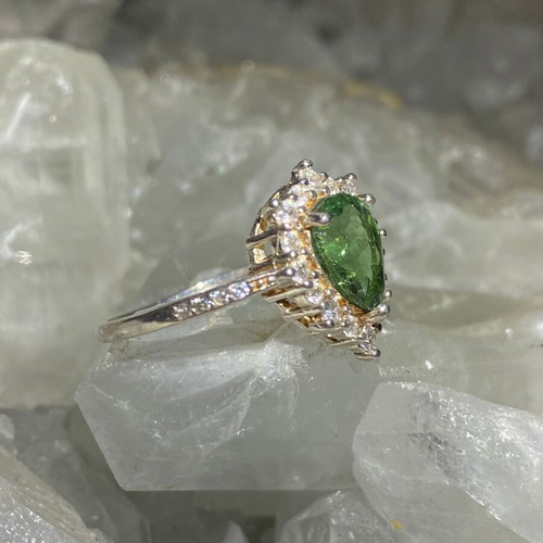 Silver ring with natural green tourmaline and moissanite