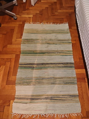 Woven rug used, neutral colors, 127cm x 72cm