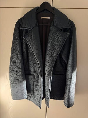 Christina Economou puffer jacket used in shimmery blue with belt