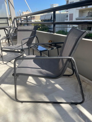 Balcony set like new with 2 armchairs and glass table