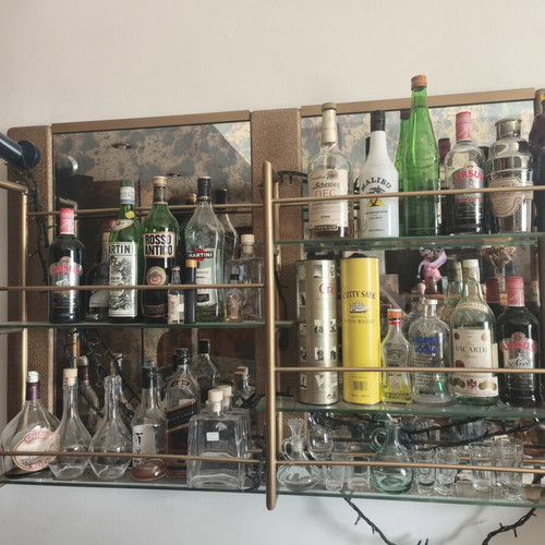 Living room bar used with large storage and glass shelves