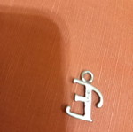 Silver pendant with letter E used
