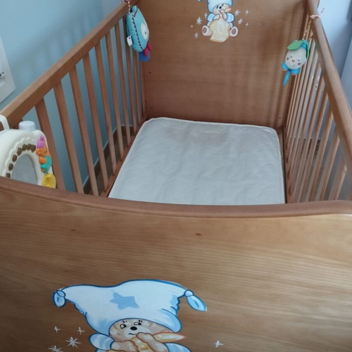 Baby cot used with mattress and adjustable height