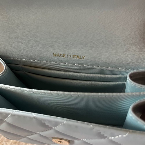 Leather baby blue handbag like new with gold chain and full packaging