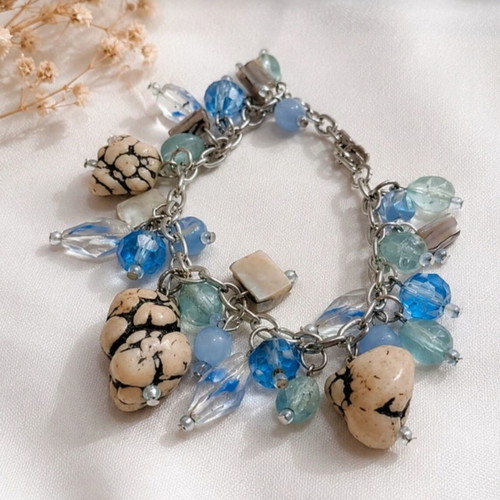 Bracelet with beige and blue elements like new