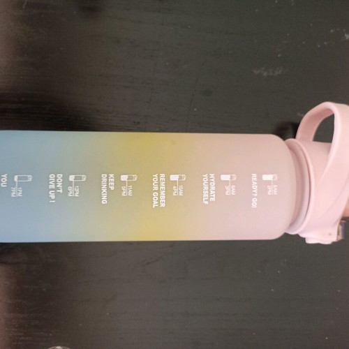 Plastic water bottle 1100ml like new with measurement scale