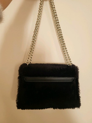Fur shoulder bag new with leatherette and metal clasp