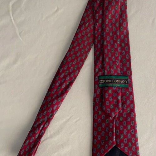 Silk tie Oxford Company used, red with green and purple paisley