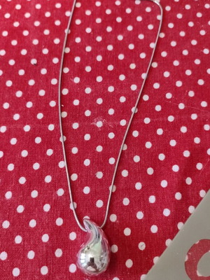 Stainless steel necklace tear-shaped like new, silver