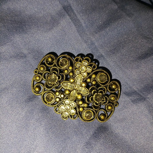 Vintage brooch used with filigree design and gold finish
