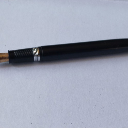 Sheaffer's vintage fountain pen set with 14K gold nibs and desk base, used