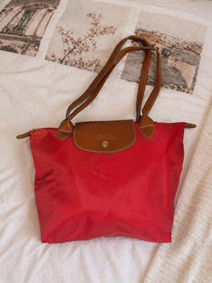 Red handbag new, practical and everyday use