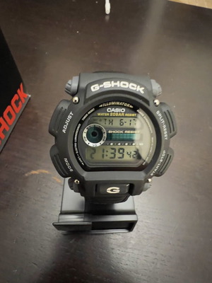 Casio G Shock DW 9052v-1cr new, black and grey with leather strap