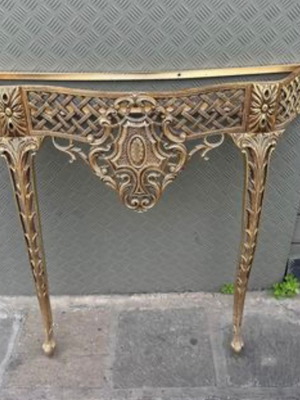 Old aluminum wall table used without marble