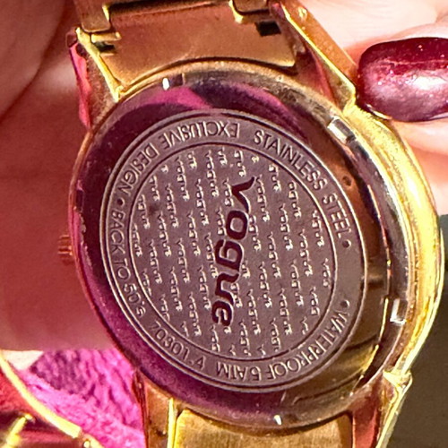 Vogue watch used, gold color with scratches