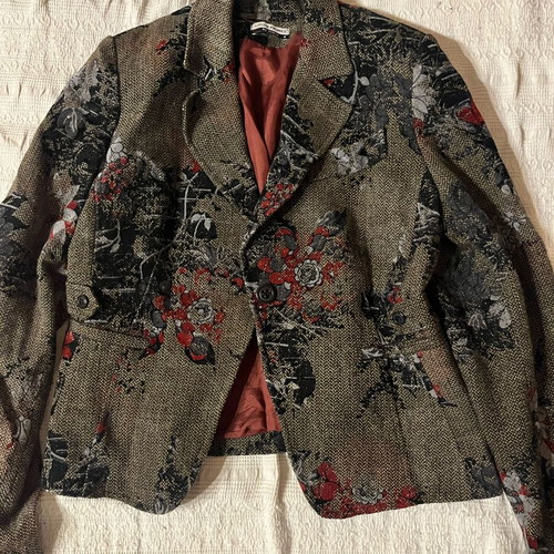 Brown jacket with burgundy patterns and details
