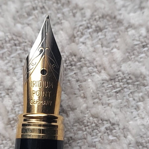 Writing set unused with pen, fountain pen and mechanical pencil in blue case