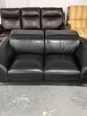 Black leather two-seater sofa with electric relaxing mechanism new