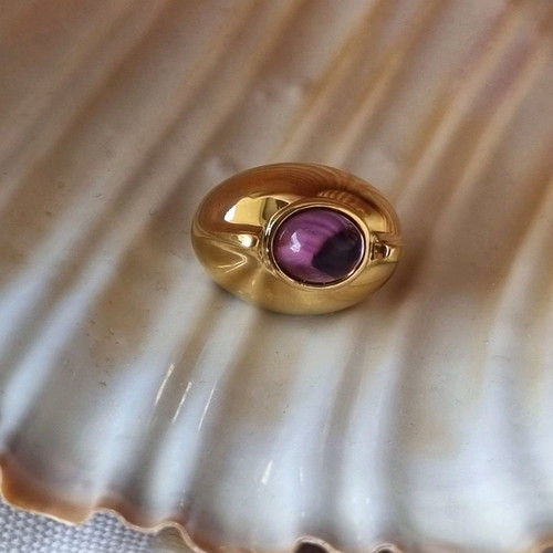 Vintage earrings used with purple stone