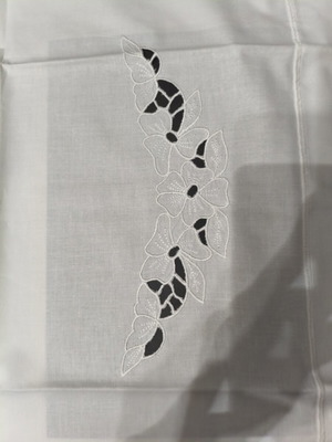 Pair of traditional pillowcases with handmade cutwork embroidery and crochet lace