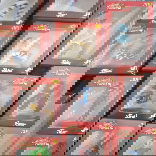 Street Fighter collection with 22 sealed figures and magazines, new