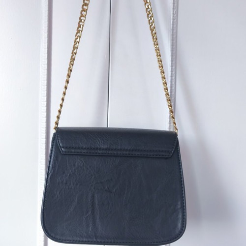 Classic black crossbody bag like new with gold chain for evening wear