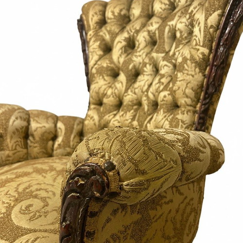 Hollywood Regency tufted armchairs used, mahogany carvings, set of two