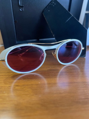 Eyepetizer sunglasses used with purple lens and gold frame