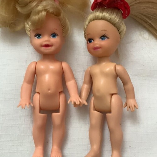 Small dolls like new with soft hair
