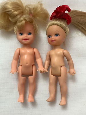 Small dolls like new with soft hair