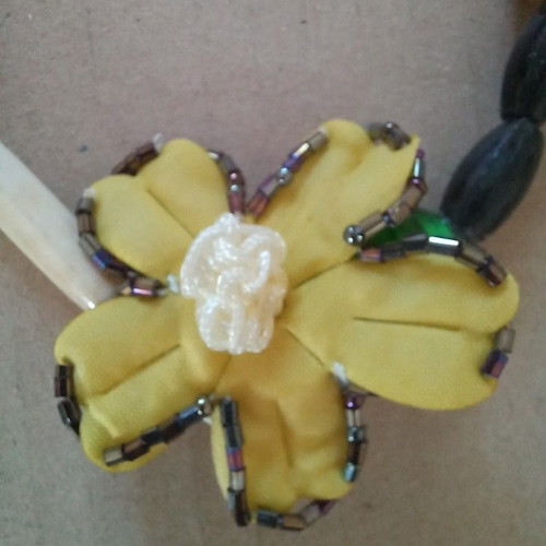 Boho necklace handmade with yellow fabric flower and mixed earthy beads