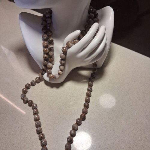 Vintage necklace like new, long with earth tone round beads